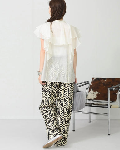Herencia<br>Frilled sheer blouse