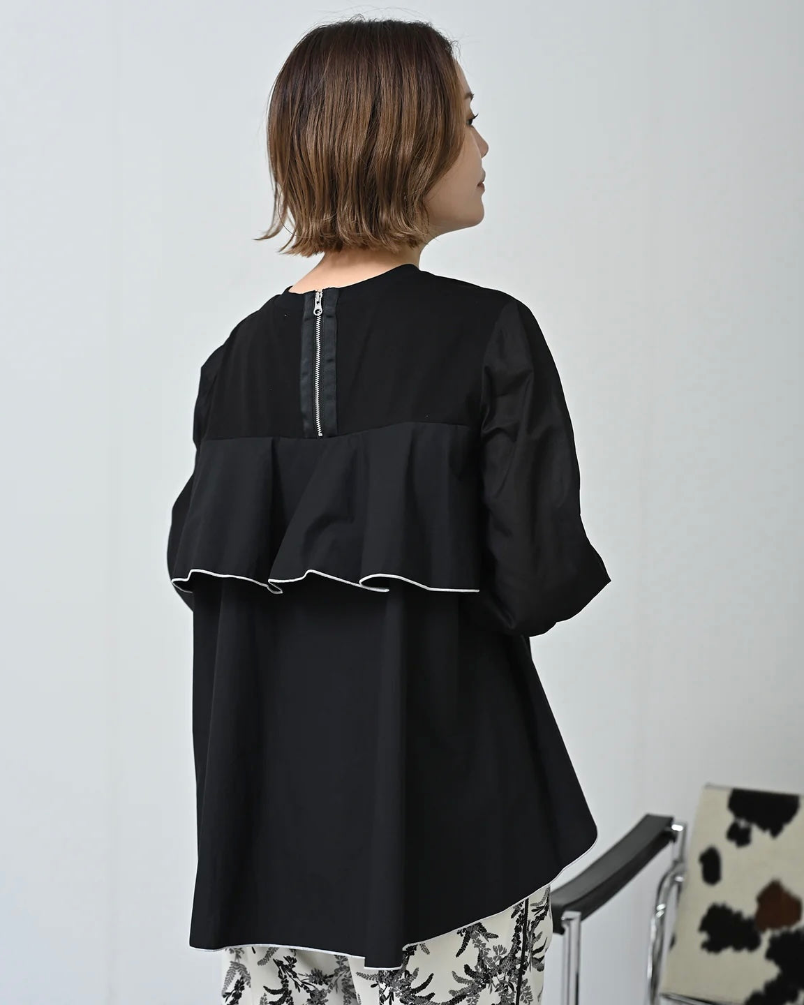 Herencia<br> バック配色メロー フリルトップス