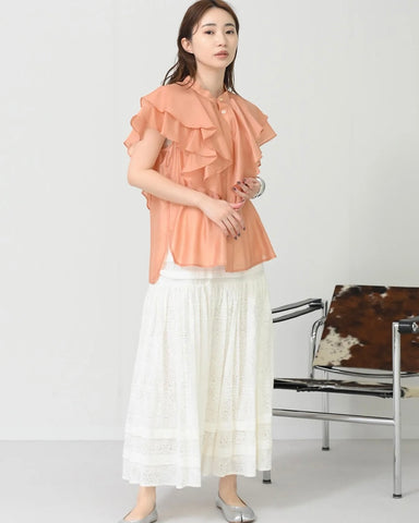 Herencia<br>Frilled sheer blouse