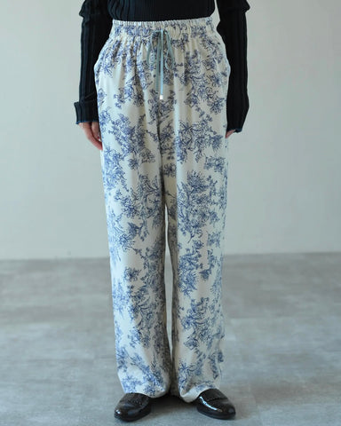 HERENCIA <br>Piping line floral print pants