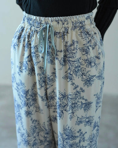 HERENCIA <br>Piping line floral print pants