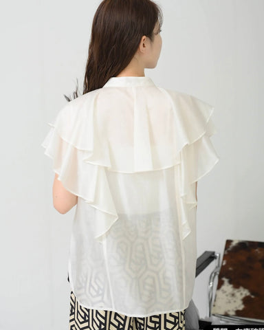 Herencia<br>Frilled sheer blouse