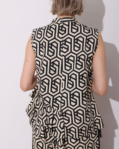 HERENCIA <br> Geometric sleeveless blouse