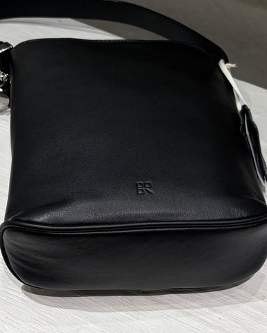 Story．<br> LEATHER ROUND HANDBAG