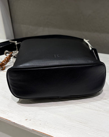 Story．<br> LEATHER ROUND HANDBAG
