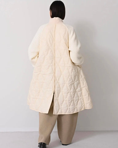 Herencia<br> High neck quilted knit coat