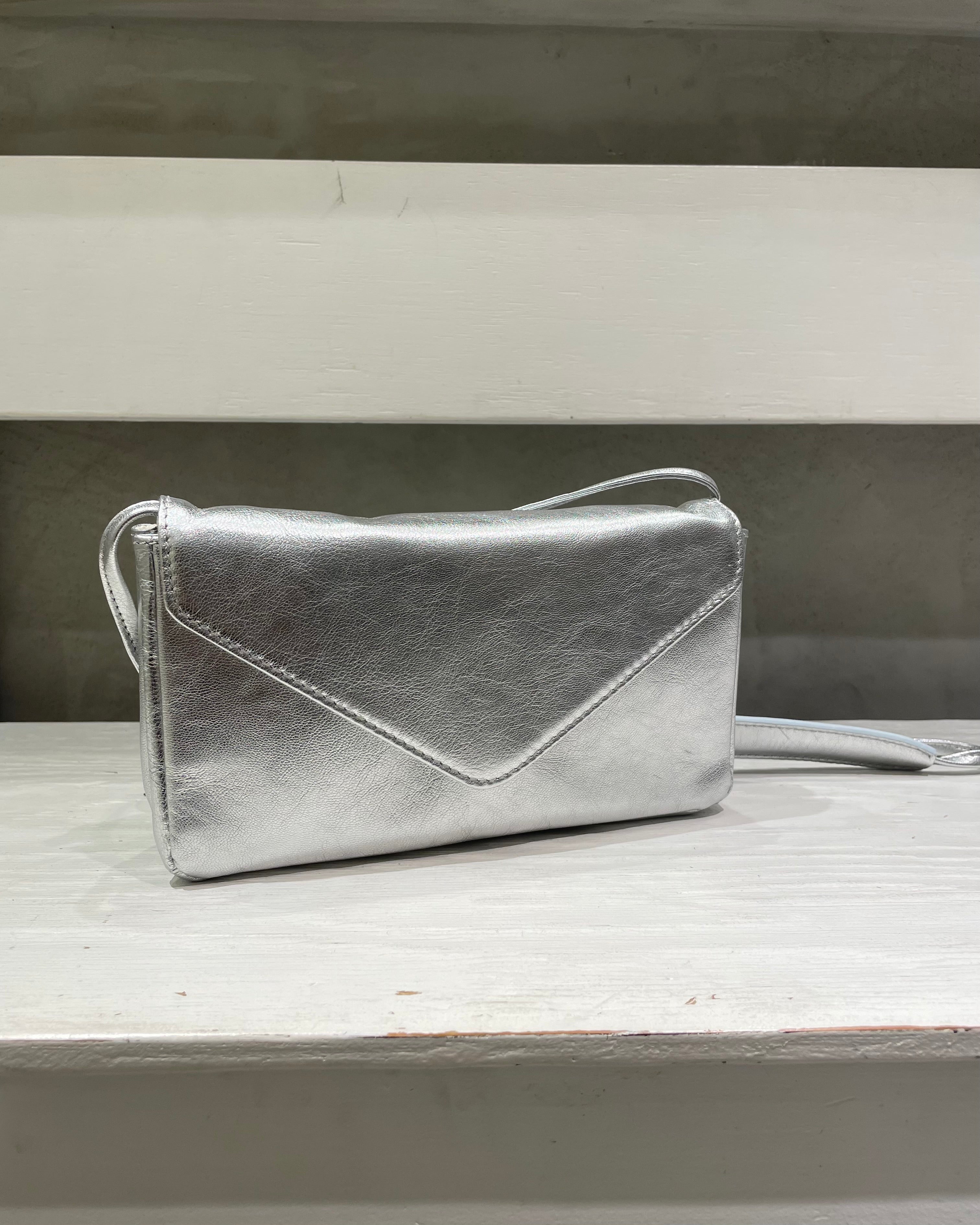 Ampersand<br>triangle flap shoulder bag
