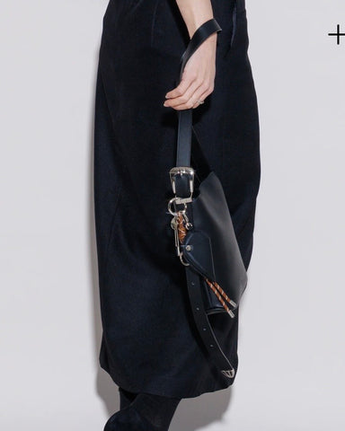 Story．<br> LEATHER ROUND HANDBAG