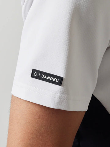 BANDEL<br>SIDE PANEL SWITCH S/S POLO SHIRTS